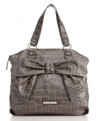 Go bold when you go out: this trendy croc-embossed handbag is embellished with a can't-be-missed oversized bow.