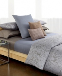 Modern sophistication rooted in natural splendor. Calvin Klein's Cayman duvet cover set is elegantly artistic with an abstract painted leaf design in shades of charcoal over a hyacinth background. Featuring hidden button closure; reverses to self.