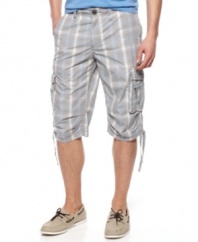 Change up your normal warm-weather pattern with these bold plaid messenger shorts from American Rag.