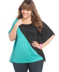 Lock up a super cool look with Soprano's batwing sleeve plus size top, highlighted by a colorblocked design.
