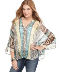 Prints of all stripes unite in this chiffon poncho top from Fire! Pairs perfectly with fun accessories for an effortless weekend look.