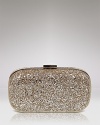 Shimmer and shine at your next soiree with Anya Hindmarch's glitter-finished leather clutch. Whether it's black-tie or cocktails, this night-light lives for invites.