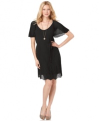 Make an impression in Studio M's elegant pleated dress. The lightweight fabric gives this look an airy, ethereal feel!