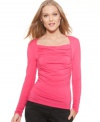 Take the traditional knit up a notch with this ruched knit top from T Tahari.