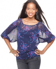 Life's a party in Living Doll's confetti printed top! Super-comfy, wear it with skinny jeans for an irresistibly cute look.