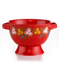 Very crafty. The bold red Pasha colander appeals with a homespun look and feel in organically shaped, artfully hand-painted earthenware from Tabletops Unlimited. With a hidden design on its base.