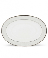 This elegant oval stand is accented with a delicate flourish of vine-like, white-on-white imprints with raised, iridescent enamel dots. 9 long. From Lenox's dinnerware and dishes collection. Qualifies for Rebate