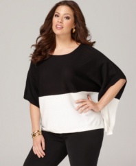 An on-trend colorblocked pattern highlights DKNYC's batwing sleeve plus size sweater-- pair it with your favorite jeans for a chic casual outfit.