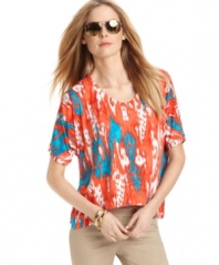 This boldly printed MICHAEL Michael Kors top adds bright springtime style to any outfit -- perfectly slouchy for an on-trend look!
