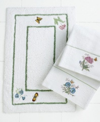 Bring the brightness of spring to your bathroom every day with this whimsical bath rug. Flowers and butterflies dance along a white ground in this pattern inspired by the acclaimed dinnerware pattern.