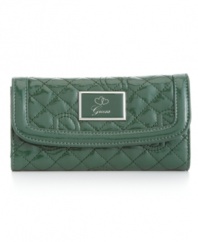 GUESS's Karima slim clutch retools the so-hot quilting trend with logo lettering and a patent gloss.