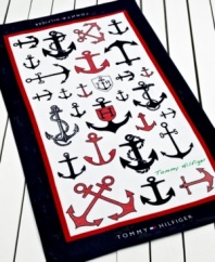 Tommy Hilfiger takes nautical inspiration to a new level in this Anchors beach towel, featuring a variety of anchors in different sizes, colors and patterns. Finish in a classic red, navy and white palette with the Tommy Hilfiger logo at each end.
