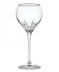 Stemware inspired by the chic London neighborhood, Wedgwood Knightsbridge wine glasses feature a delicately round shape with deep cuts around the bowl, accented with a platinum rim. The stem resembles a flower when viewed from above.