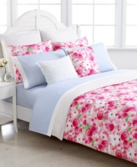 Reminiscent of a quaint backyard garden, Tommy Hilfiger's Rose Cottage comforter set features an allover watercolor rose print in a bright pink colorway with pops of green for a picturesque look.