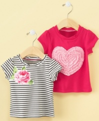 Frilly appliques add girlish appeal to this adorable shirt from First Impressions.