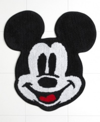 See you real soon! The ever-lovable Mickey Mouse steals the show in this bath rug from Disney, featuring a classic Mickey face in pure tufted cotton for a playful addition to your bathroom.