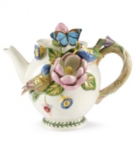 Tea party turned garden party. A special piece from Portmeirion, this Botanic Hummingbird teapot has it all, from butterflies to branch handle and even the triple-leaf border of Botanic Garden dinnerware.