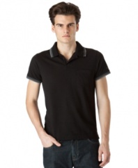Modern minimalism. This Calvin Klein polo shirt is a sleek sporty look for the weekend.