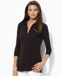 Rendered in fluid matte jersey for a flattering drape, this Lauren by Ralph Lauren tunic exudes chic minimalist style with three-quarter sleeves and a feminine V-neckline.