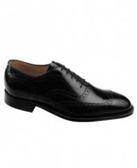 Featuring timeless details and embellishments, this sophisticated pair of wingtip men's dress shoes puts the finishing touches on a professional look for the office.