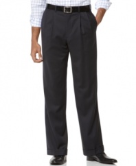 Relax in smooth, truly dapper style. This elegant navy dress pant features sophisticated double reverse pleats, on-seam side pockets, and button-through besom pockets on back. Extendable waistband. Cuffed buttoms.