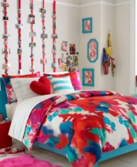 The Poppy Art Floral comforter set from Teen Vogue bedding features vibrant cool blues, purples and greens mixing with hot reds, oranges and pinks for an ultimate expression in modern art. Coordinate with the Poppy Art striped sheet set for unique and revolutionary bedroom style.