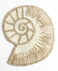 Life's a beach! Charm your bathroom in a look of seaside-inspired beauty with this shell shaped bath rug. Tufted with latex backing.