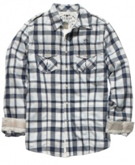 Military-inspired details like epaulets and chest pockets add a rugged feel to this sleek shirt from Guess.