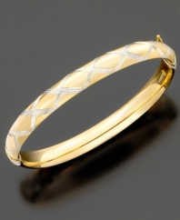 A pretty bangle bracelet dressed up with a diamond-cut design. Crafted of 14k gold over sterling silver and sterling silver. Approximate diameter: 2-1/2 inches.