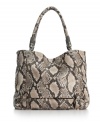Get sassy in snakeskin with this fabulous look by Jessica Simpson. A sleek all-over snakeskin print is accented with antique brass hardware for an eye-catching allure.