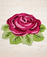 Kissed by a rose. Keep this Homewear kitchen rug underfoot for added comfort when you're washing dishes or preparing a meal. A fun flower shape and vivid pinks and greens lend bold garden style to any setting.
