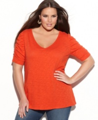 Accented by ruching, INC's short sleeve plus size top is key for your casual lineups this season.