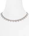 With delicate silver and crystal links, this Deco-inspired necklace from Nadri is a look straight from the Roaring Twenties -- slip it on to jazz up every evening look.