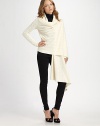 Subtly draped Italian wool and cashmere with cable-knit construction that exudes modern elegance. Draped open frontLong dolman sleevesRibbed cuffs and hemAsymmetrical cropped back hem80% wool/20% cashmereDry cleanImported of Italian fabric