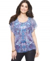 A flowing, sheer top from One World adds a touch of exotic glamour to any outfit!