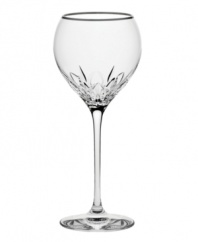 Inspired by the chic London neighborhood, Wedgwood Knightsbridge stemware features a delicately round shape with deep cuts around the bowl, accented with a platinum rim. The stem resembles a flower when viewed from above. Goblet shown 2nd from right.