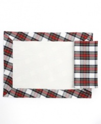 Holiday prep. The Ryleigh Tartan plaid napkin from Lauren Ralph Lauren offers smart style for casual Christmastime dining in machine washable cotton with stripes of red, green and blue. (Clearance)