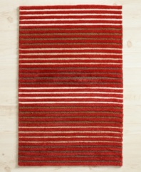 Featuring textured stripes in spicy tones of red, white and cinnamon, the Martha Stewart Collection HiLo accent rug warms up any room in your home.