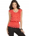 Ruffles and lace create a flirty union on this top from BCX that indulges your girlish side!