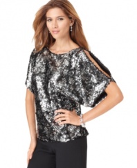 This sequined, split-sleeve top by R&M Richards puts on a dazzling display when it catches the light!