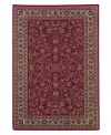 Inspired by the lovely Sarouk carpets of ancient Persia, this rug features an intricate floral motif in ivory, sage green and accents of soft blue against a rich red ground.