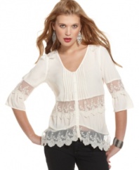 Add some vintage charm to your summer wardrobe with Rampage's lace top!