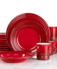 The dinnerware set that has it all. Crafted for durability and ease of use but with a brilliant enamel finish to redefine the table, Le Creuset place settings lend smart, enduring style to everyday dining. Featuring a three-ring design in bold cherry red.