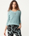 A hot layering piece, this Kensie open-stitch sweater adds a laid-back look to any outfit!