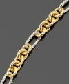Classic style with a touch of charisma. This beautiful bracelet is crafted in 14k gold over sterling silver and sterling silver. Approximate length: 7-1/2 inches.