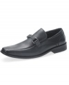 A streamlined bike toe and tonal metal bit across the vamp accent these polished leather loafers for men from Kenneth Cole Reaction. There's no doubt that this pair of men's dress shoes is equipped with all the details needed to complete a modern wardrobe.