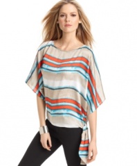 With bright stripes, this MICHAEL Michael Kors top features an on-trend slouchy shape and self tie -- perfectly paired with the season's skinny jeans!