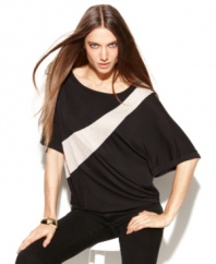 INC ups the ante on a fluid-draped top with colorblocking and sequins! A great day-to-night option.