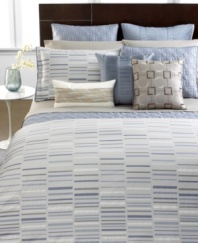 Hotel Collection's Gradient sham features a rectangle pattern in soft silver, platinum, and charcoal hues accented with shades of blue.
