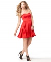 The silhouette says sweet, the hue says siren: Rev up your next night out in this red GUESS dress, with its fitted bodice and full, flared skirt. (Clearance)